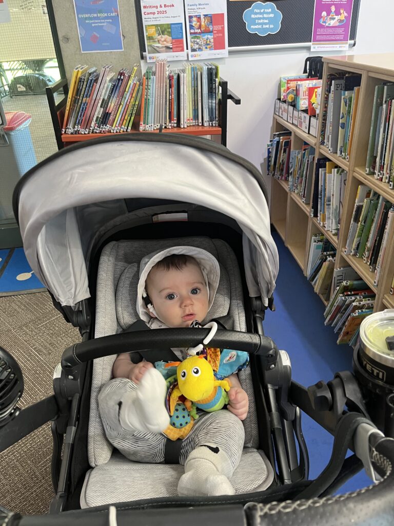 baby in stroller at the library