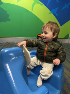 baby playing on ferry